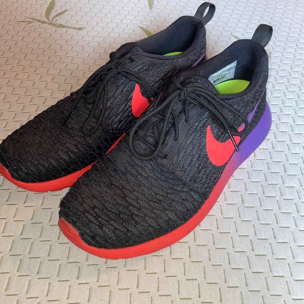 Nike Women’s Black Running Shoes with Red & Purple Accents